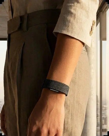 Close-up of Hume Band 2.0 worn on wrist with linen sleeve — metabolic capacity tracking in everyday life